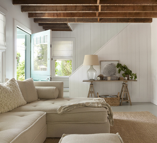 Cottage-Living-Room-Design.-Neutral-Cottage-Living-Room.-Cottage-living-room-features-rustic-plank-ceiling-and-white-plank-walls.-Cottage-BeachCottage-Livingroom.-