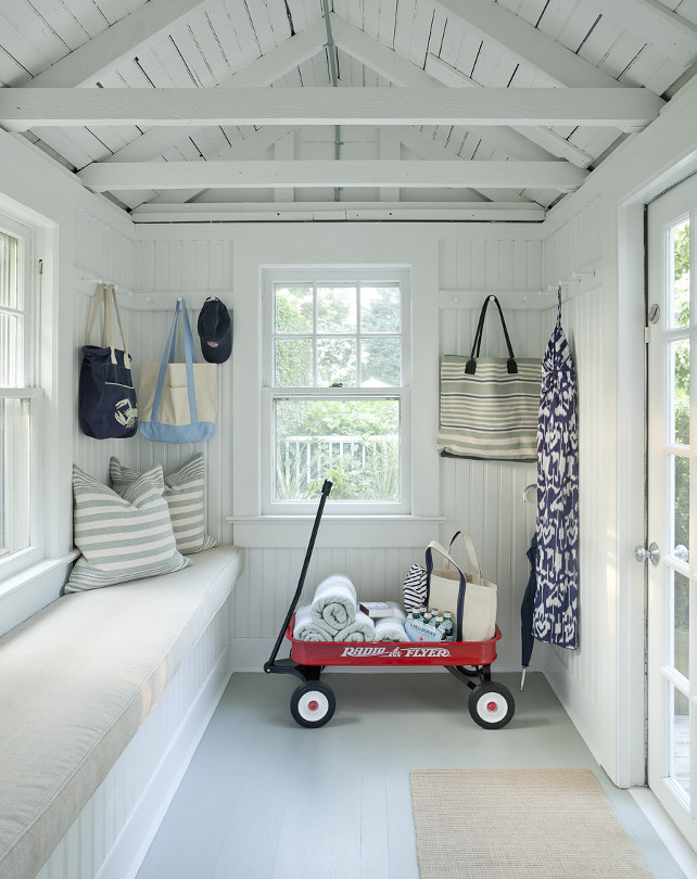 Shed-Interior-Ideas.-This-backyard-shed-is-used-as-a-playroom-play-area-for-the-kids.-The-playroom-features-painted-wooden-floors-and-a-window-seat.-Playroom-Playarea-shed-Emily-Gilbert-Photography.